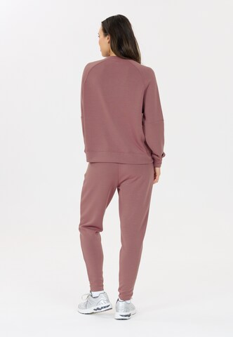 Athlecia Regular Sports trousers 'Jacey' in Red