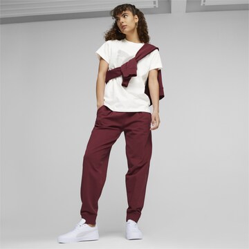 PUMA Tapered Sporthose 'Her' in Lila