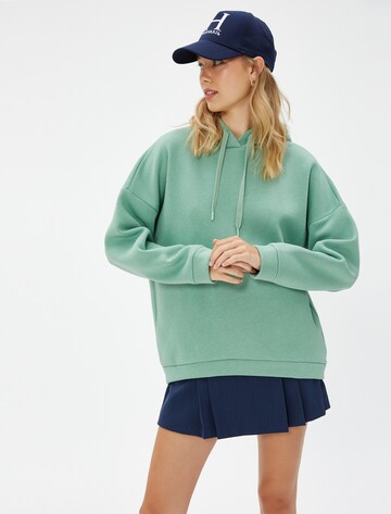 Koton Sweatshirt in Groen: voorkant