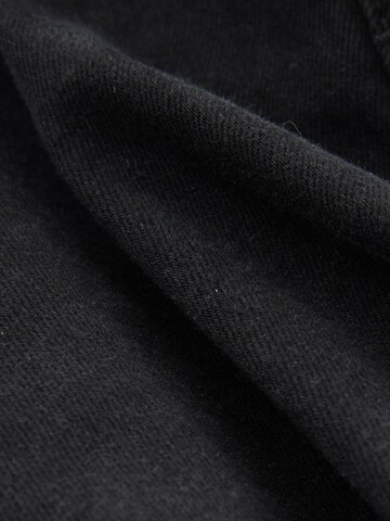 Skinny Jeans de la Next pe negru