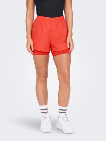 ONLY PLAY Loose fit Workout Pants in Orange: front