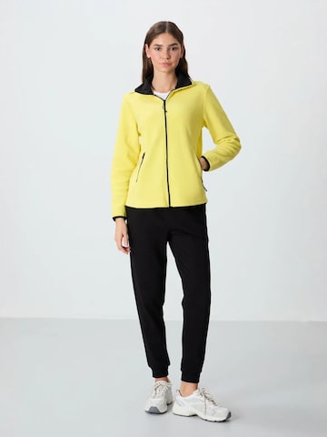 Tommy Life Fleece jas in Geel