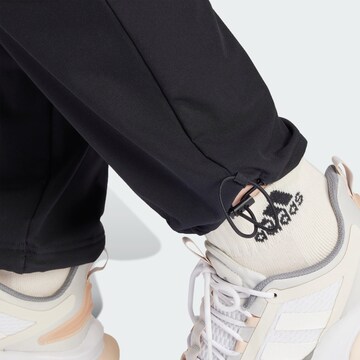 Regular Pantalon de sport 'City Escape' ADIDAS SPORTSWEAR en noir