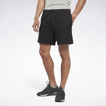 Reebok - Regular Calças de desporto 'Vector' em preto: frente