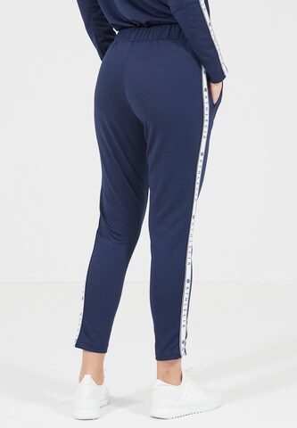 Athlecia Skinny Trainingshose 'Sella' in Blau