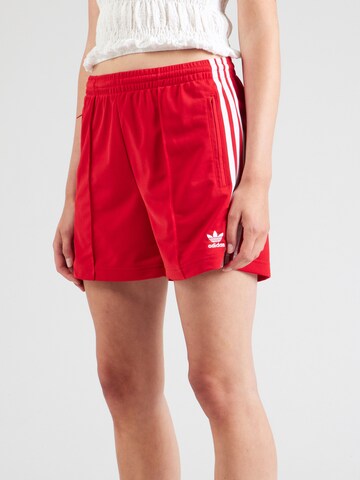 ADIDAS ORIGINALS Loose fit Trousers 'Firebird' in Red: front
