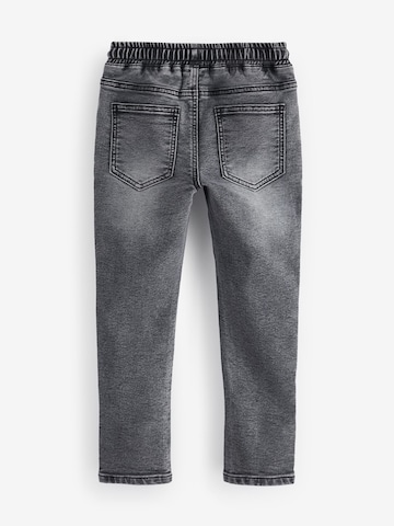 Skinny Jeans di Next in grigio