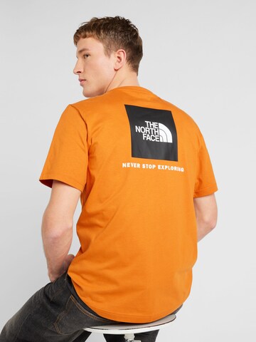 THE NORTH FACE T-shirt 'REDBOX' i orange: framsida