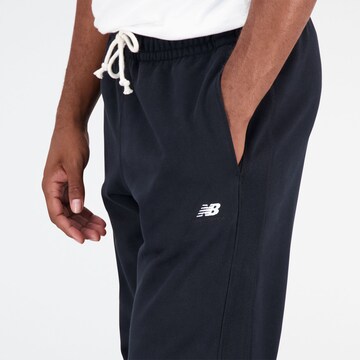 new balance Tapered Broek in Zwart