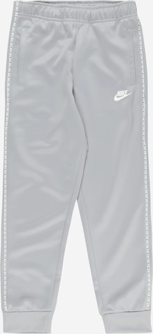Nike SportswearHlače - siva boja: prednji dio