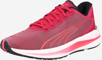 Chaussure de course PUMA en rouge : devant