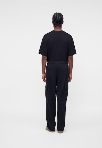 Nike Sportswear Loosefit Hose 'Club Fleece' in Schwarz