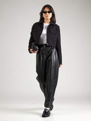 Largi Pantaloni cutați de la ARMANI EXCHANGE pe negru
