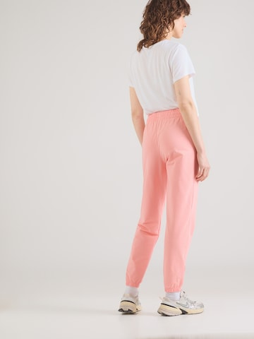 UNDER ARMOUR Tapered Sporthose in Pink