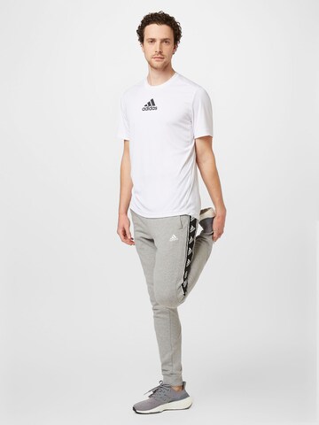 ADIDAS SPORTSWEAR Tapered Sporthose 'Brandlove' in Grau