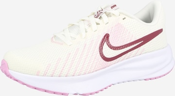 NIKE Juoksukengät 'Run Defy' värissä vaaleanpunainen: etupuoli