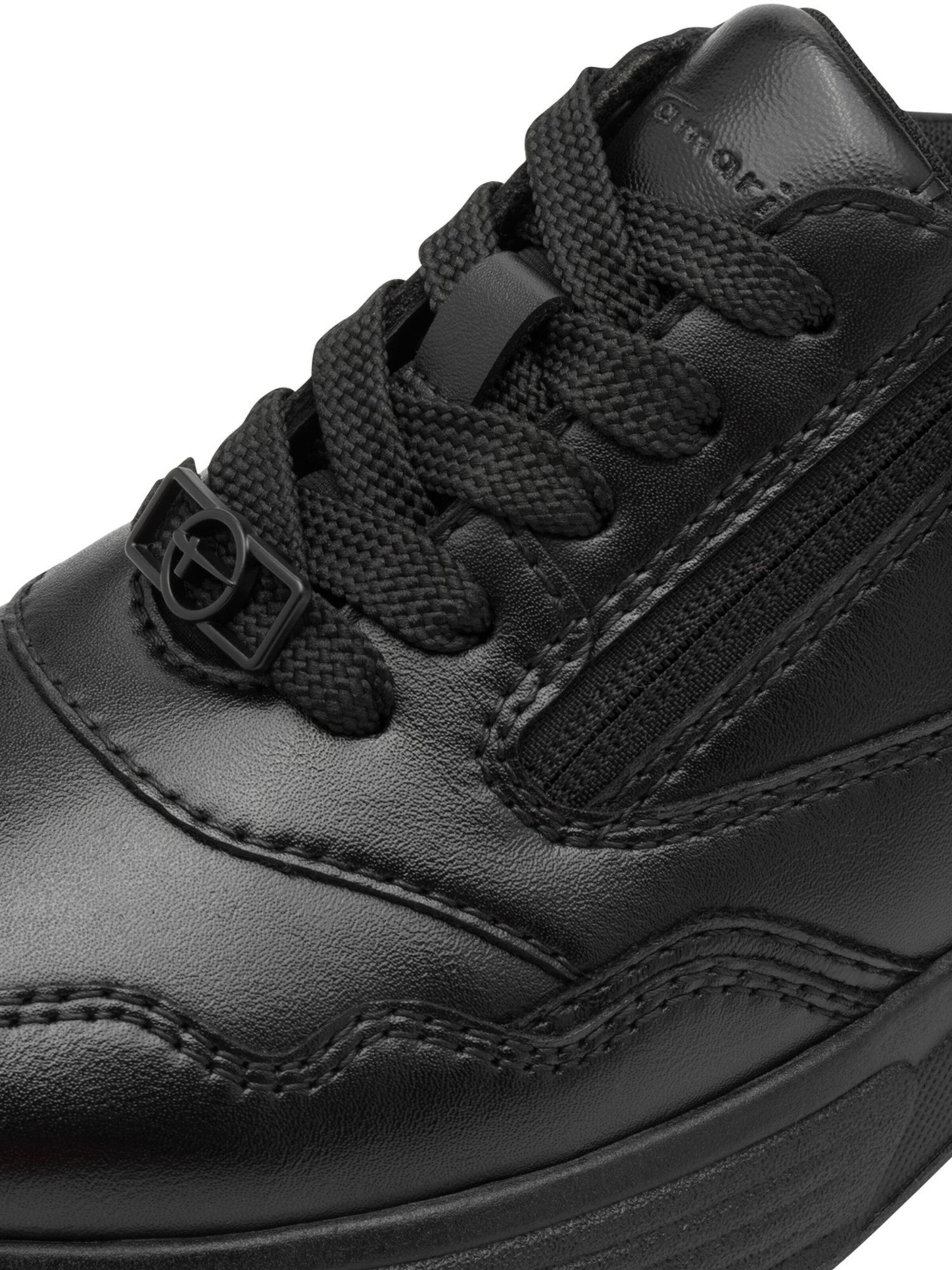 Baskets basses Tamaris en noir