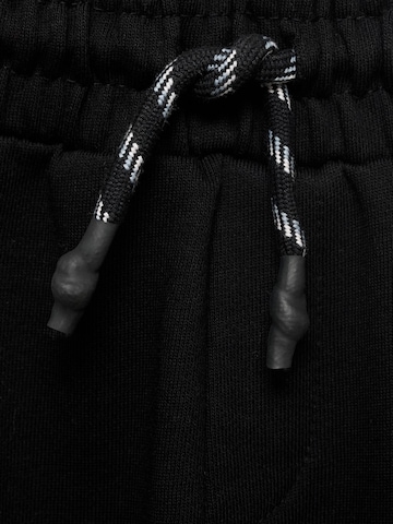 MANGO KIDS Дънки Tapered Leg Панталон 'FRANCIA' в черно