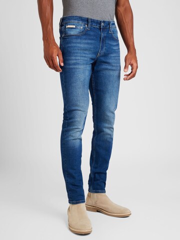 Coupe slim Jean Calvin Klein Jeans en bleu : devant