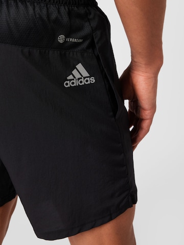 ADIDAS SPORTSWEAR Normalny krój Spodnie sportowe 'Run It' w kolorze czarny