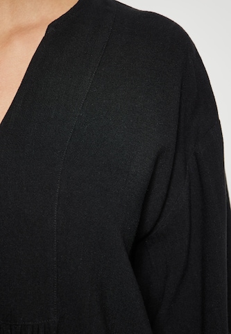 Usha - Blusa en negro