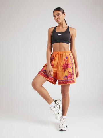 ADIDAS SPORTSWEAR - regular Pantalón deportivo 'FARM' en naranja