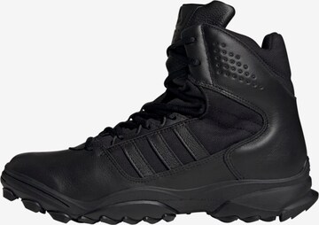 ADIDAS PERFORMANCE Boots in Black: front