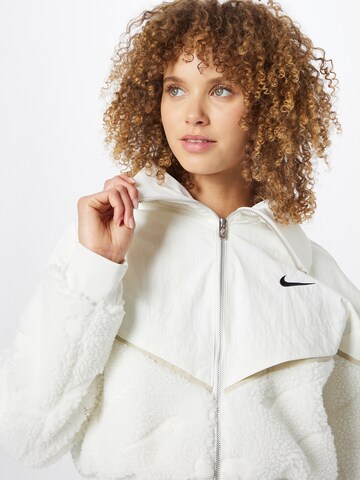 Nike Sportswear Přechodná bunda – béžová