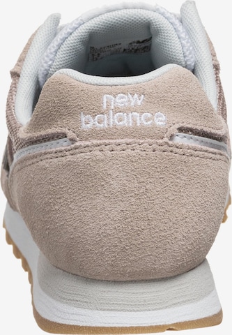Sneaker bassa '373' di new balance in beige
