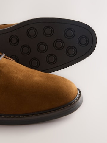Next Chukka boots in Brown