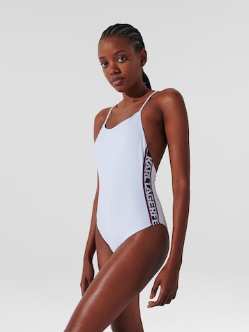 Karl LagerfeldJednodijelni kupaći kostim 'Essential' - bijela boja: prednji dio