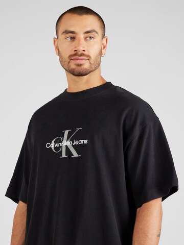 Calvin Klein Jeans Majica 'ARCHIVAL' | črna barva