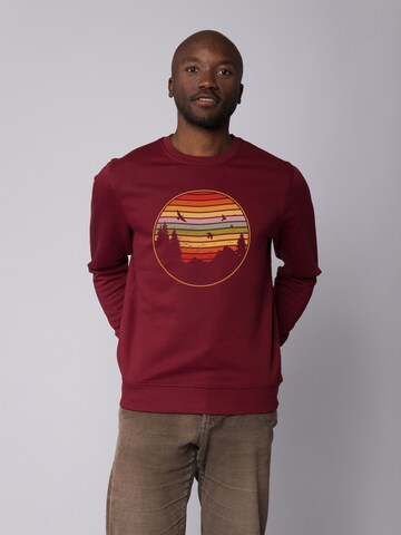 Felpa ' Sunset Berge & Tannen ' di Watapparel in rosso: frontale