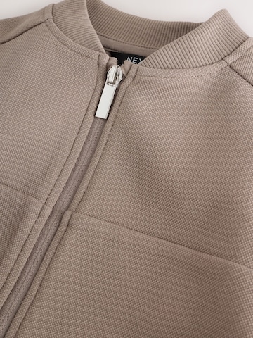 Set Next en marron
