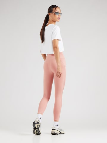 NIKE Skinny Spodnie sportowe 'ONE' w kolorze różowy