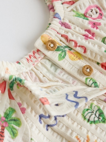 Ensemble Next en mélange de couleurs