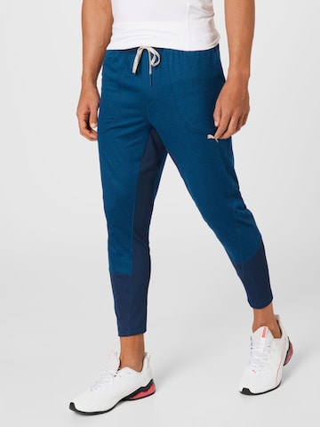 PUMA Regular Workout Pants in Blue: front