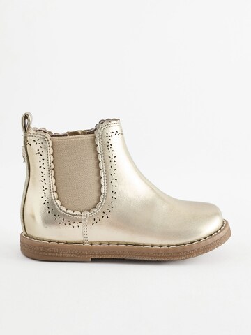 Bottes Next en or