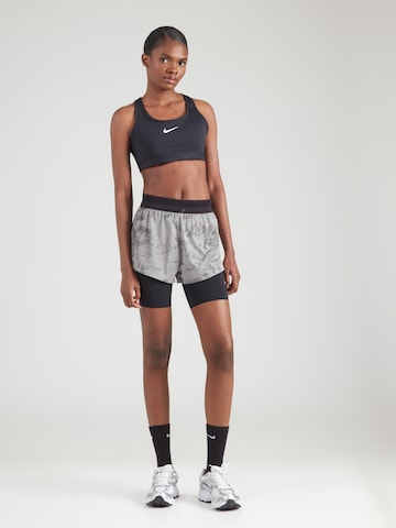 NIKE Slimfit Športne hlače 'SWFT' | siva barva