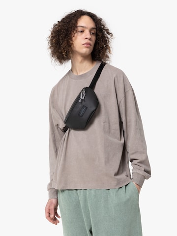 EASTPAK Magväska 'Springer' i svart
