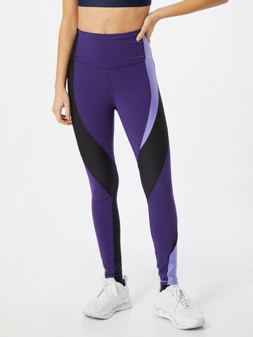 Reebok Skinny Spodnie sportowe w kolorze fioletowy: przód