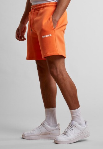 Regular Pantalon de sport Starter Black Label en orange