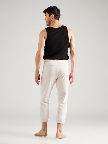 ADIDAS PERFORMANCE - Tapered Pantalón deportivo en rosa