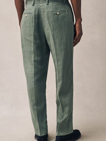 Next Slimfit Suorat housut värissä vihreä