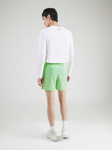 Regular Pantaloni sport 'LAUNCH' de la UNDER ARMOUR pe verde