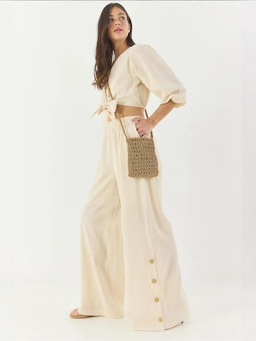 Completo pantalone di Bianco Lucci in beige