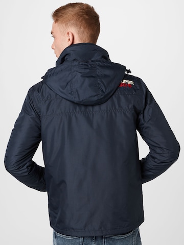 Superdry Kurtka zimowa 'Mountain' w kolorze niebieski