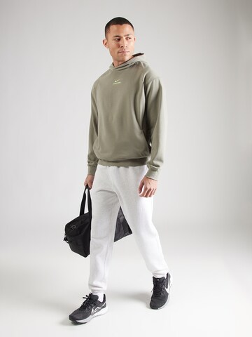 NIKE - Camiseta deportiva 'NPT' en verde