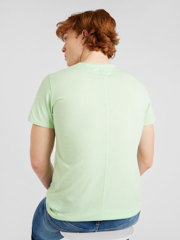 Tommy Jeans Regularny krój Koszulka 'Jaspe' w kolorze zielony