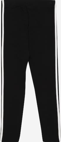 ADIDAS SPORTSWEAR Skinny Urheiluhousut 'Essentials 3-Stripes' värissä musta